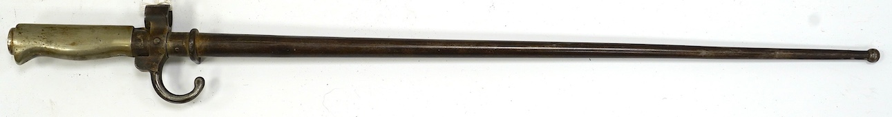 An 1886 French Lebel bayonet and scabbard. Condition - good